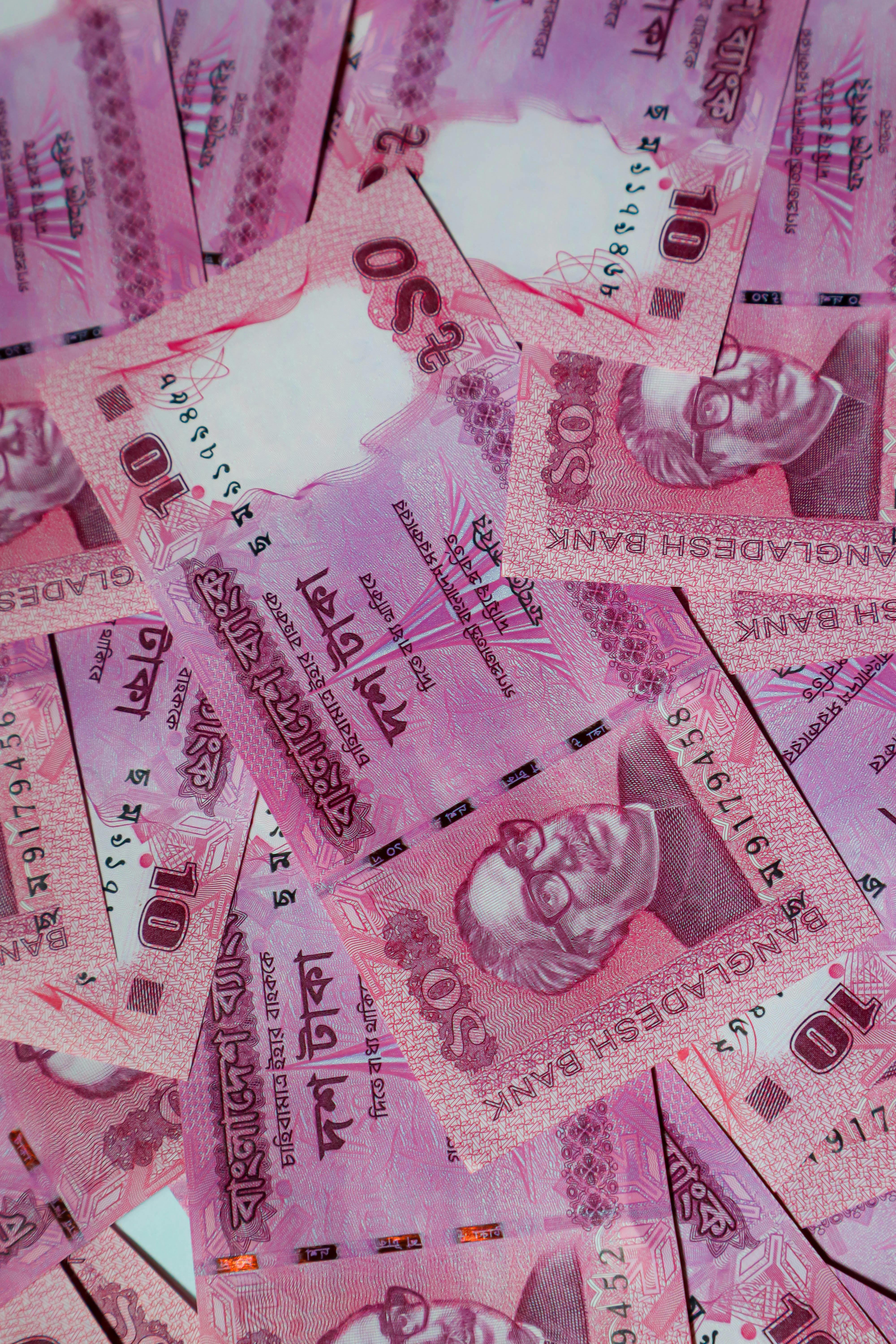 A Person Holding Rupee Banknotes · Free Stock Photo