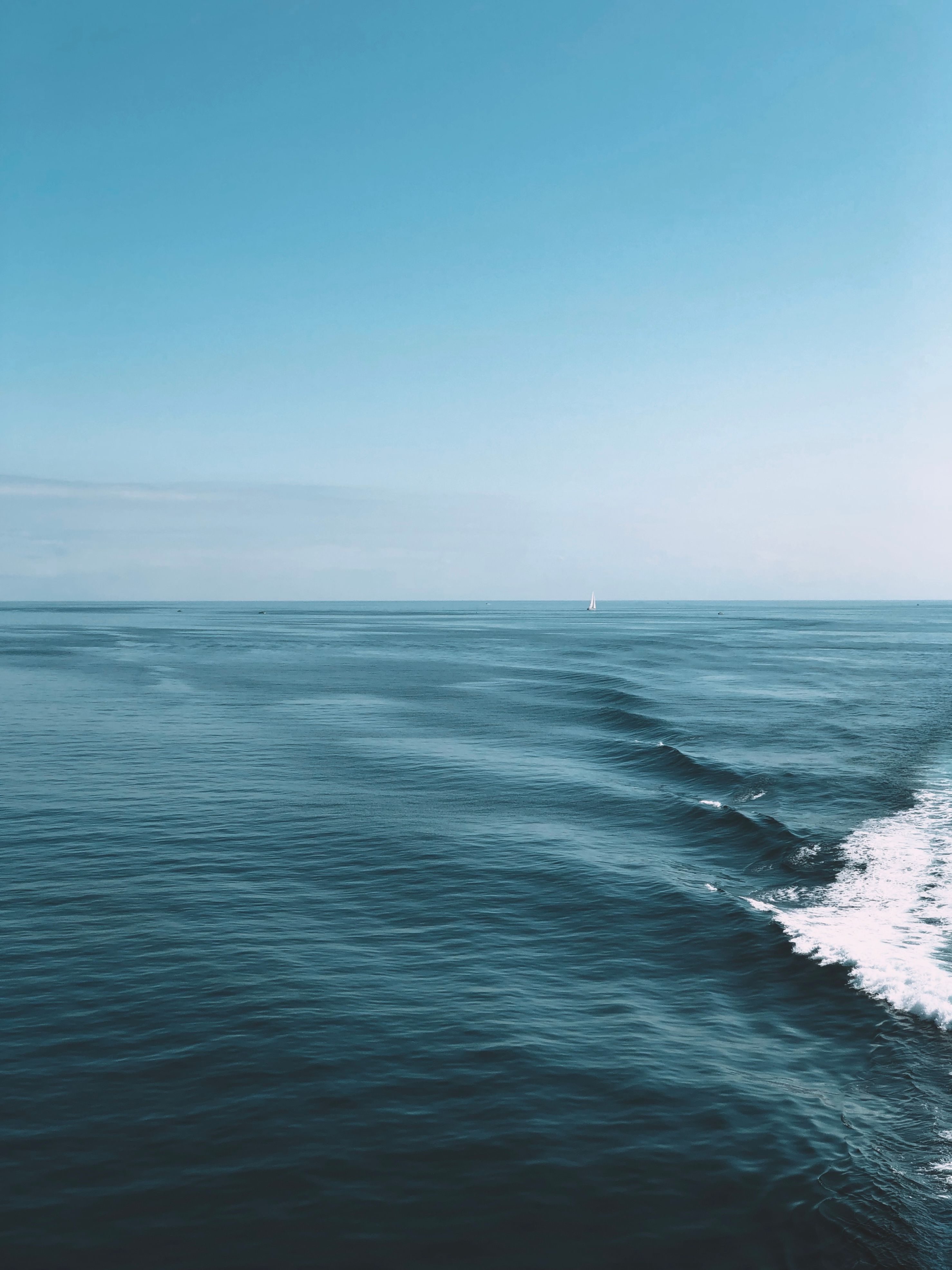 Seascape with Water Trail left by a Motorboat · Free Stock Photo