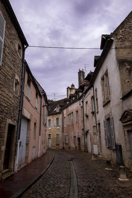 Empty Paved Street in an Old Town Part of a City 