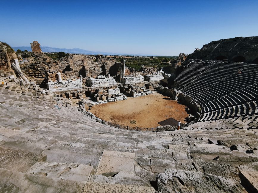Ancient Roman Theatre in Plovdiv, Bulgaria, with city in background