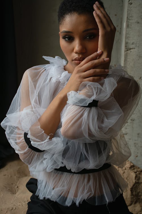 Model in White Tulle Blouse with Black Bands