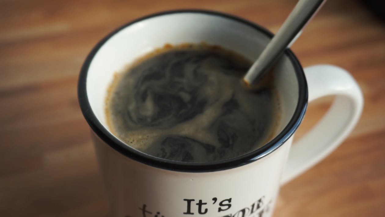 White Ceramic Mug With Black Coffee