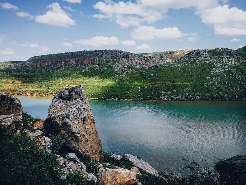 Big Canyon cliffs and emerald water
