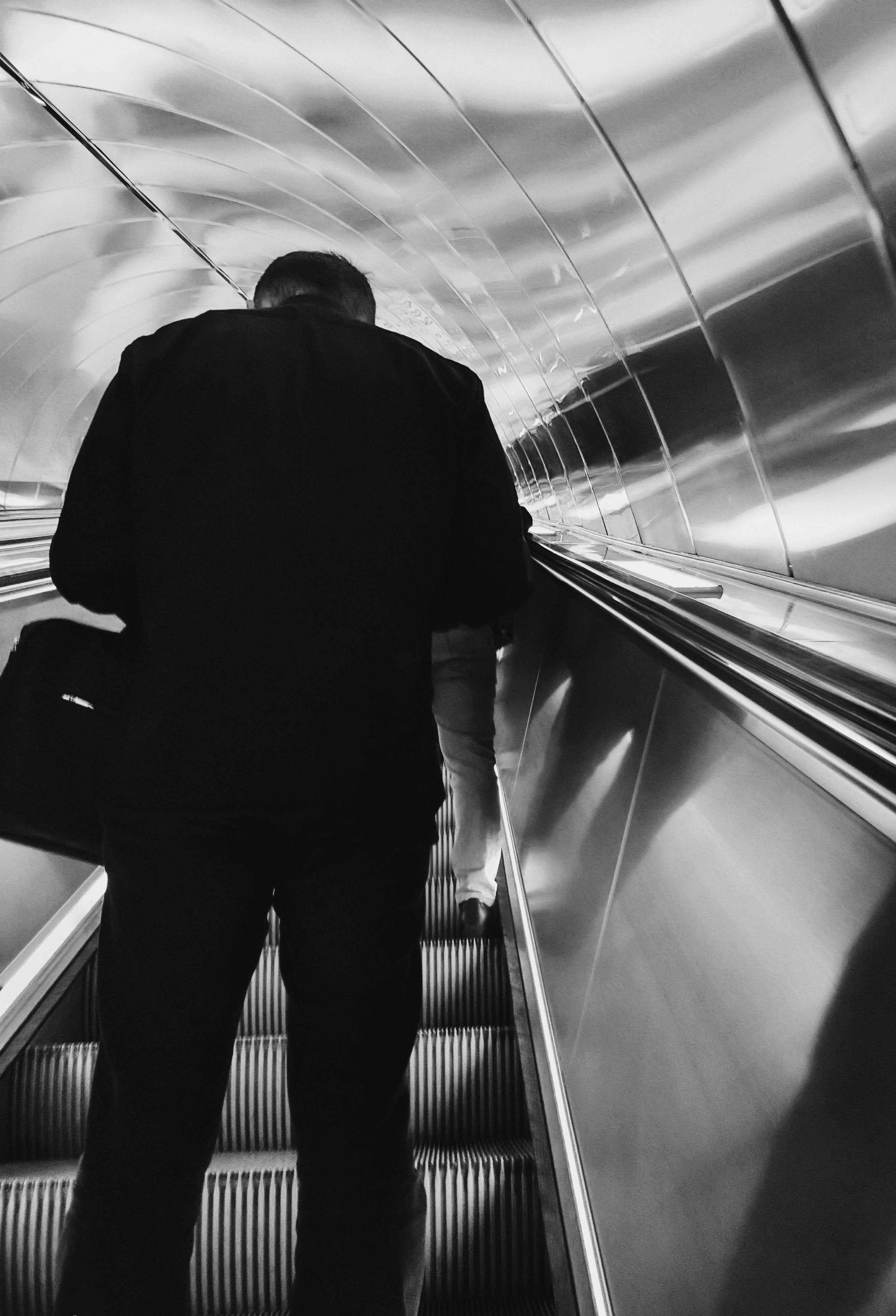 Person on Escalator · Free Stock Photo