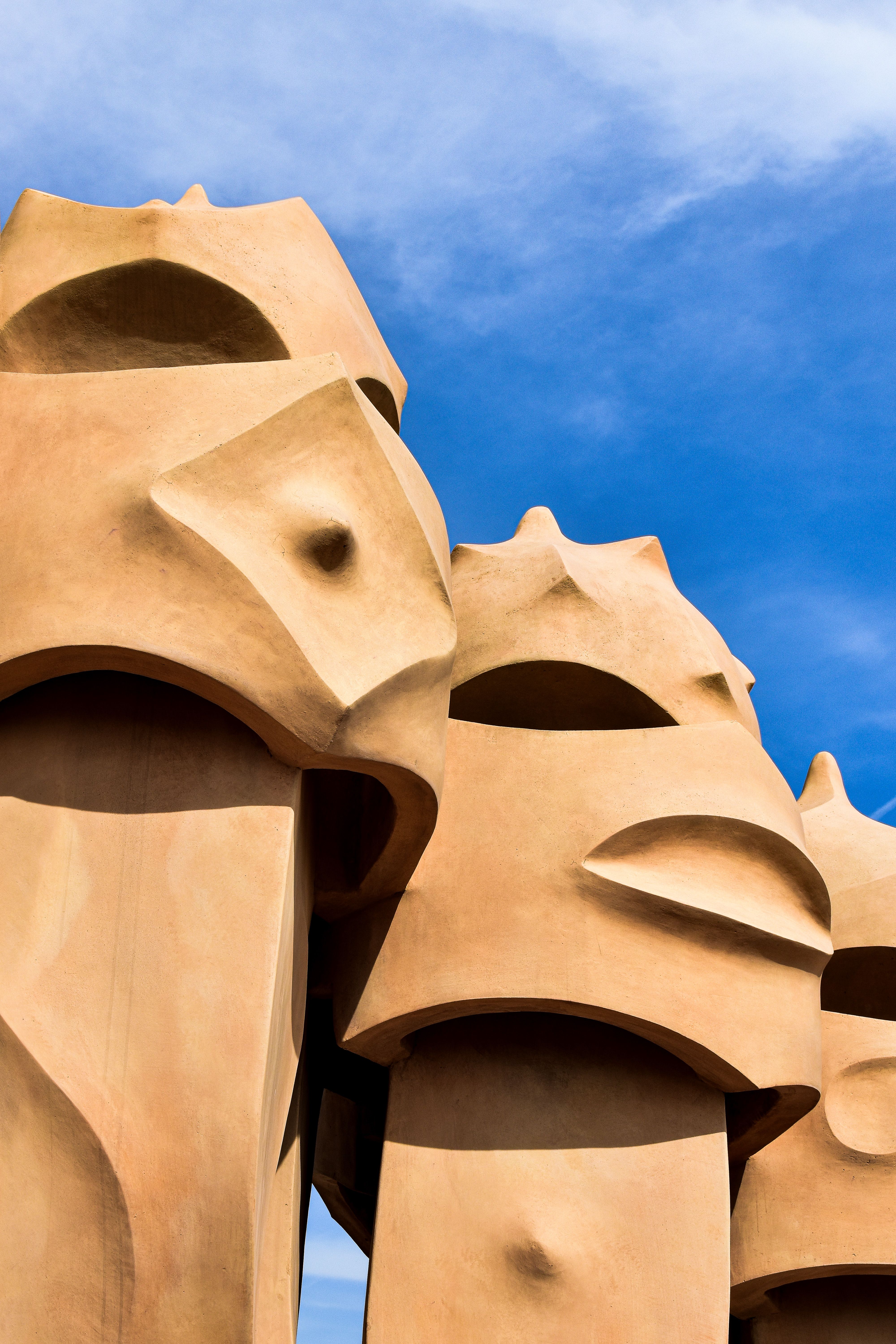 Close-up of Casa Mila's rooftop sculptures in Barcelona showcasing Gaudi's unique architectural style.