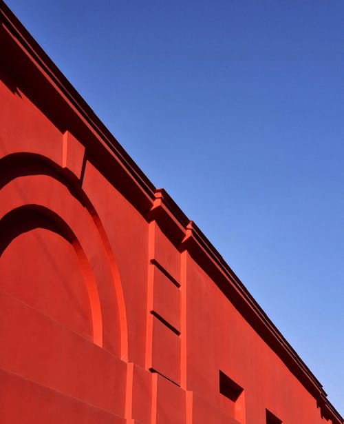 Sunlit, Red Building Wall
