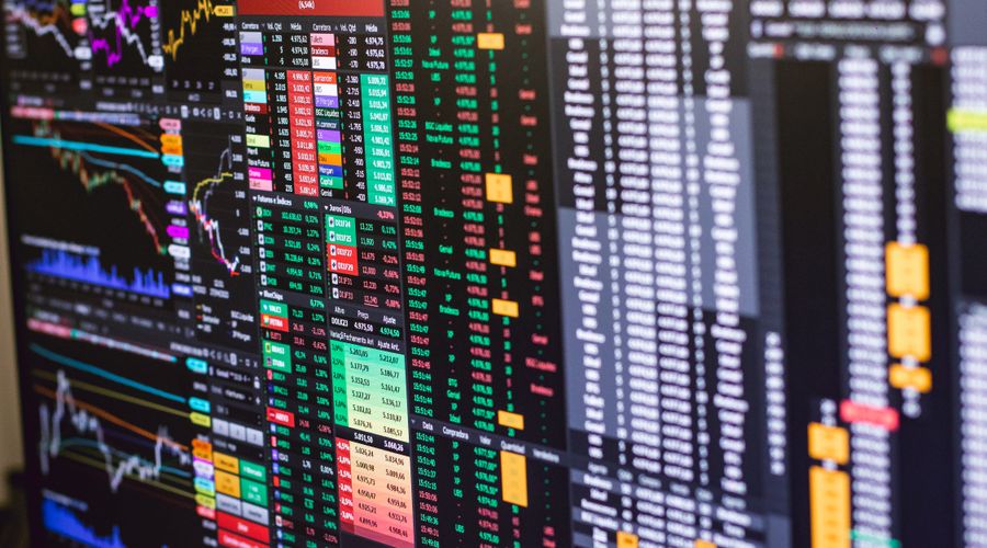 Detailed financial trading charts with colourful market data representing intraday price action