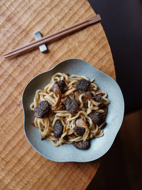 Chopsticks near Meal on Plate