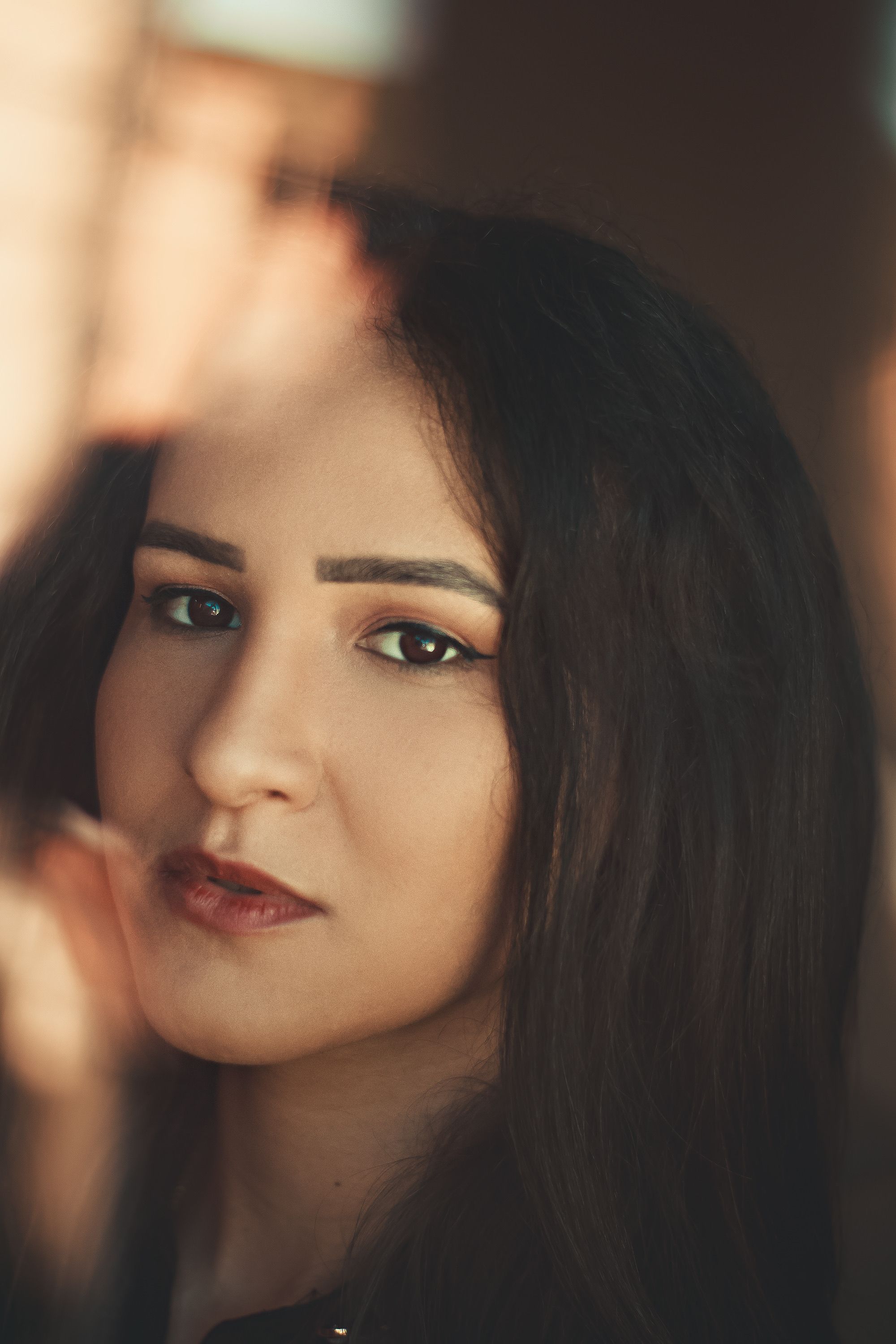 Face of Posing Woman with Black Hair · Free Stock Photo