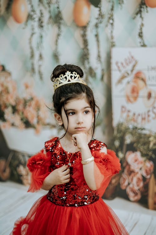 Portrait of Little Girl Wearing Red Dress 
