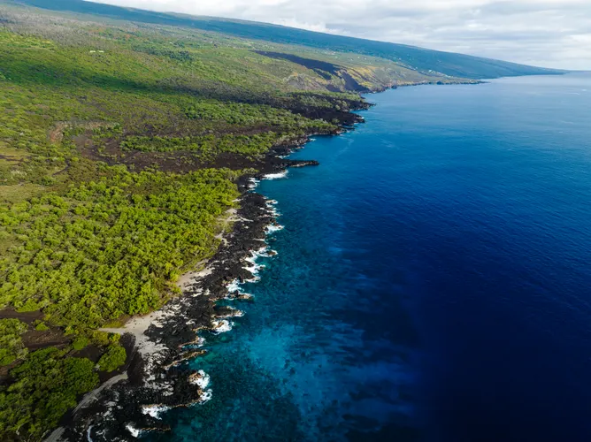 Aerial view of the lush coastline of the Big Island of Hawaii