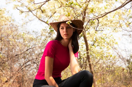 Beautiful Woman in a Hat and Red T-shirt 