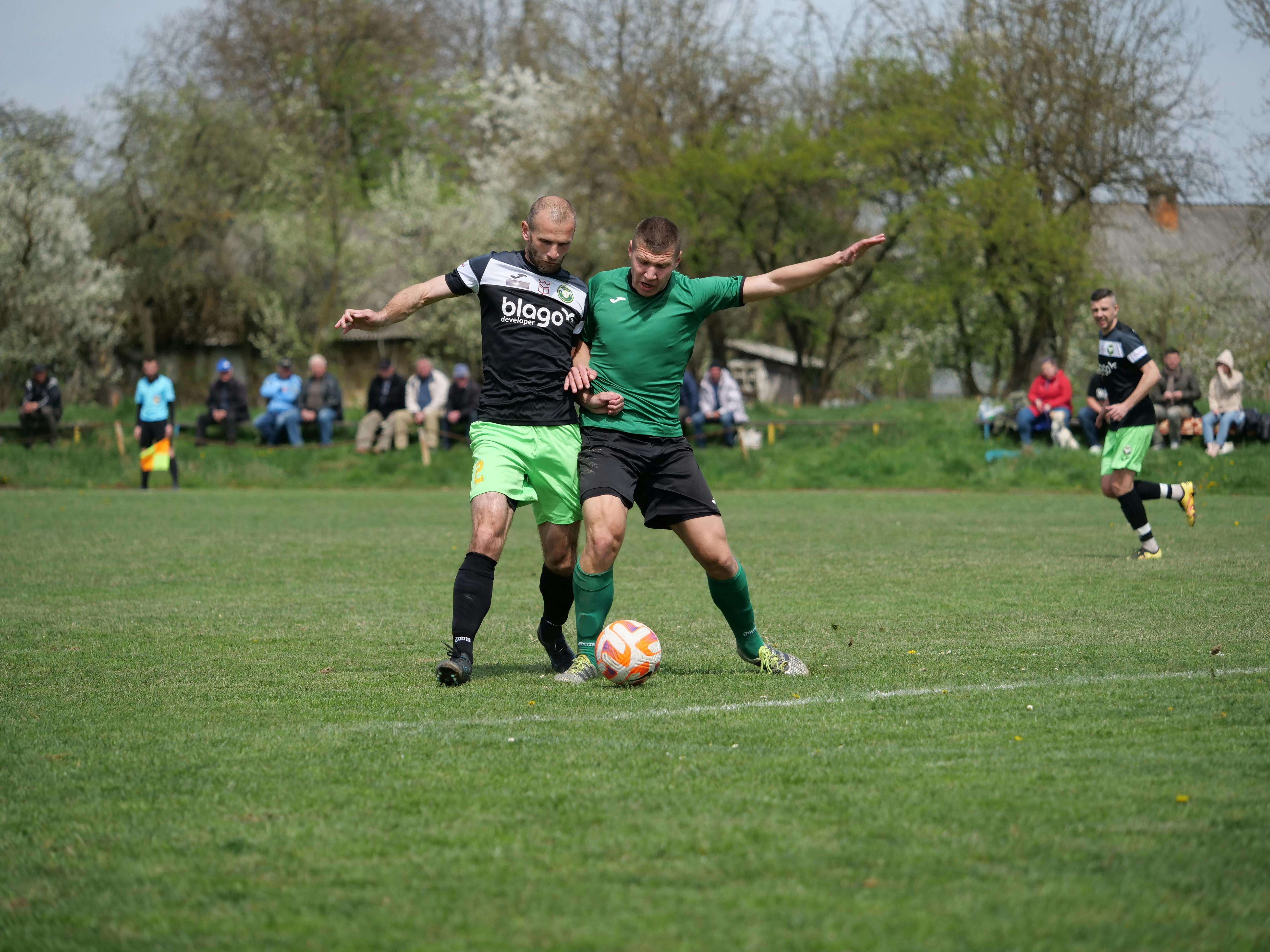 men playing soccer