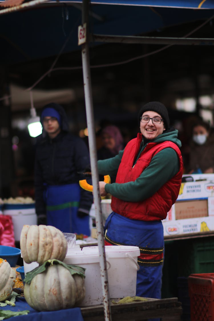 Cheerful Merchant In Market