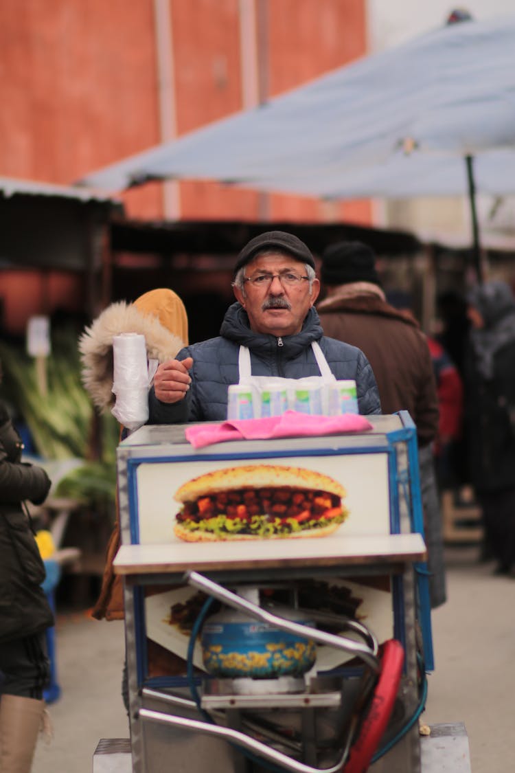 Merchant With Food Cart