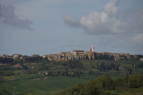 Free Beautiful panoramic view of a historic hilltown in the Italian countryside under a cloudy sky. Stock Photo