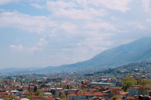 Free Explore the stunning skyline and mountain backdrop of Bursa, Türkiye on a sunny day. Stock Photo