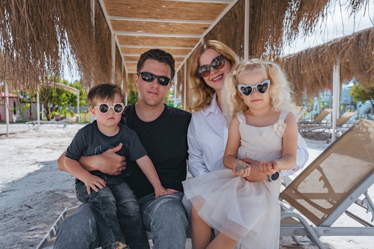 Family On A Sunny Beach 