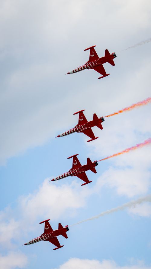 Free Turkish aerobatic planes perform stunning maneuvers during an air show in İstanbul's blue skies. Stock Photo