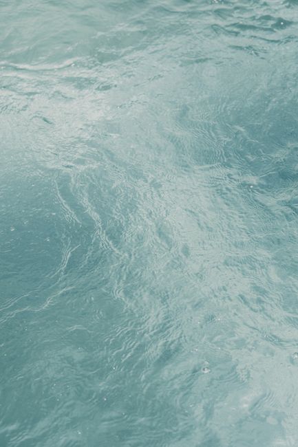 A serene close-up of clear water with gentle ripples creating a calming effect.