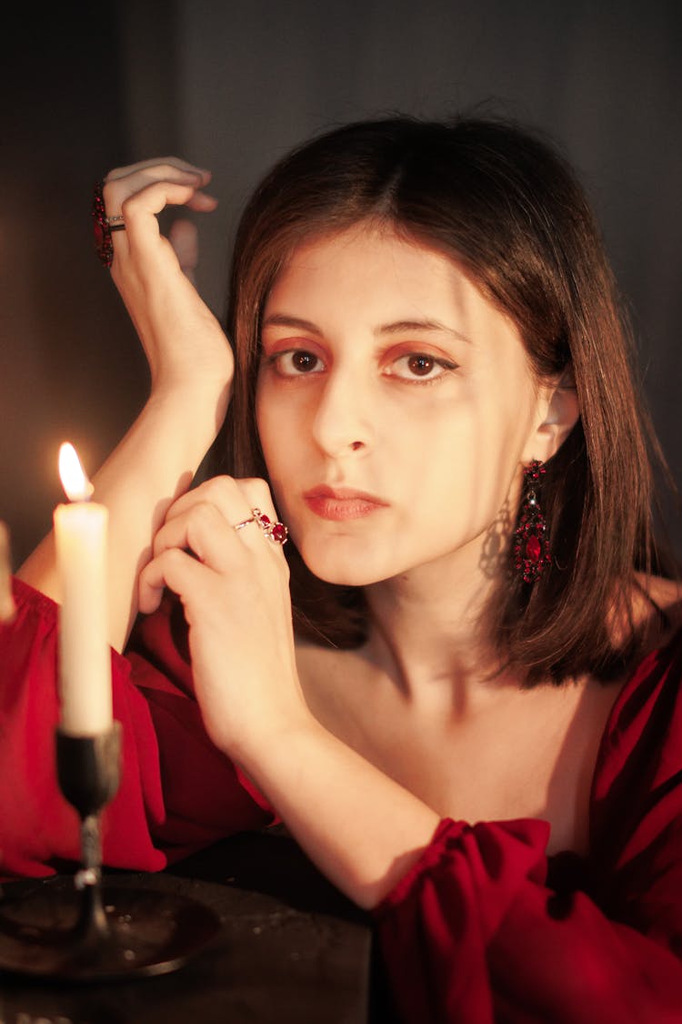 Young Woman Next To A Candle 