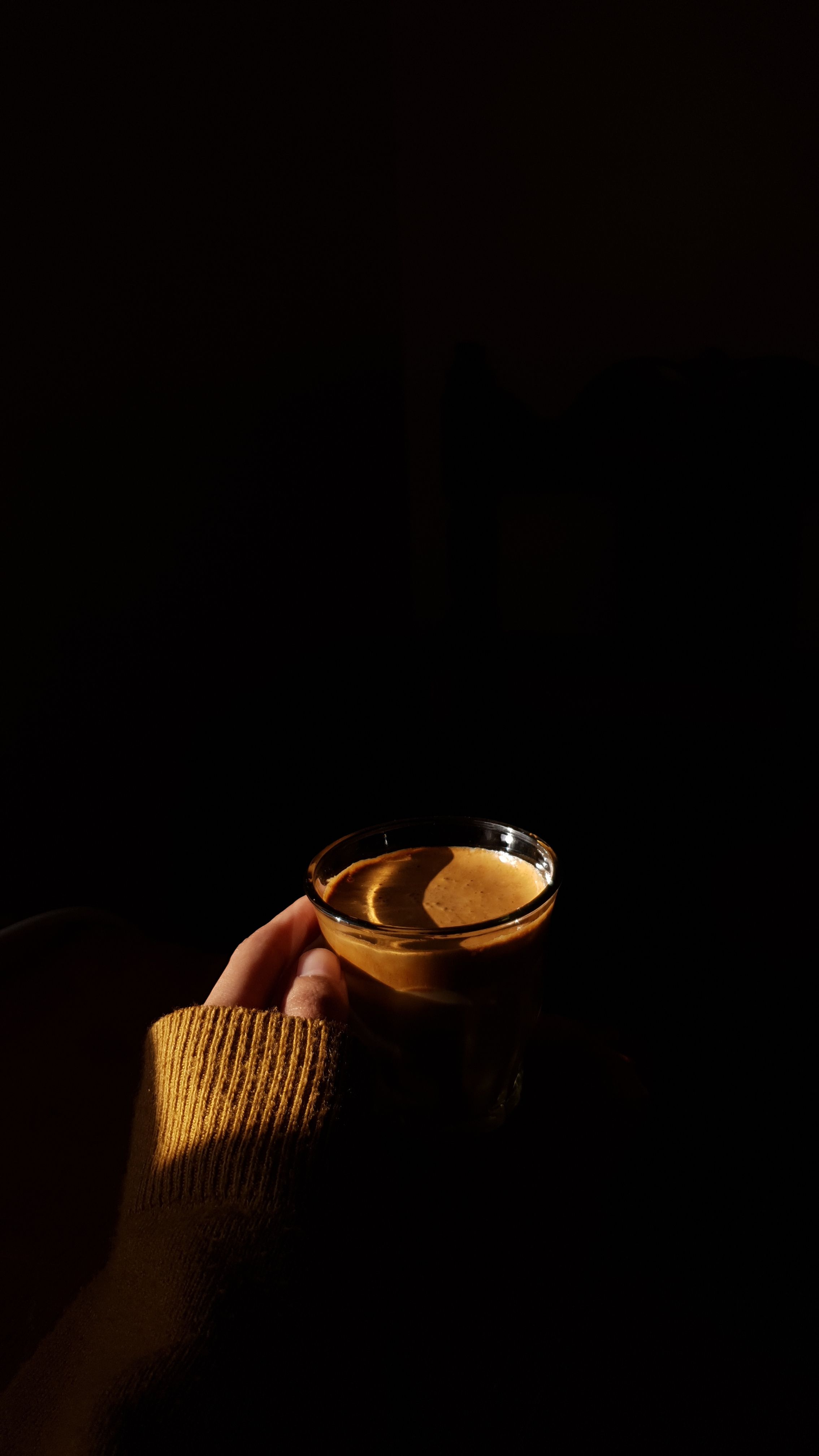 woman hand holding coffee glass