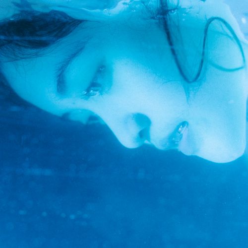Underwater portrait in blue water by Rizky Sabriansyah on Pexels