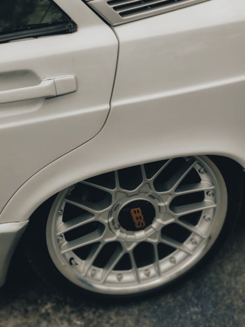 Close-up of Silver Rims on a Vintage White Mercedes 