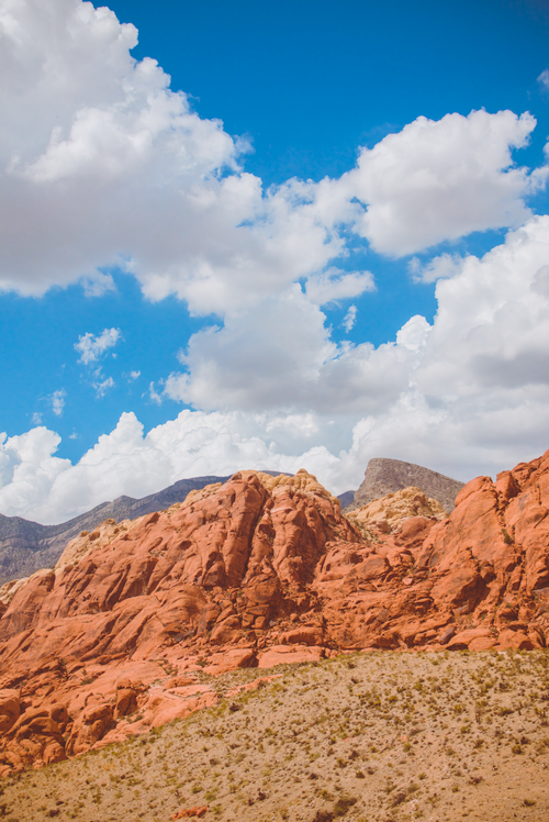 Free Captivating view of Red Rock Canyon's striking red sandstone formations under a vibrant blue sky. Stock Photo
