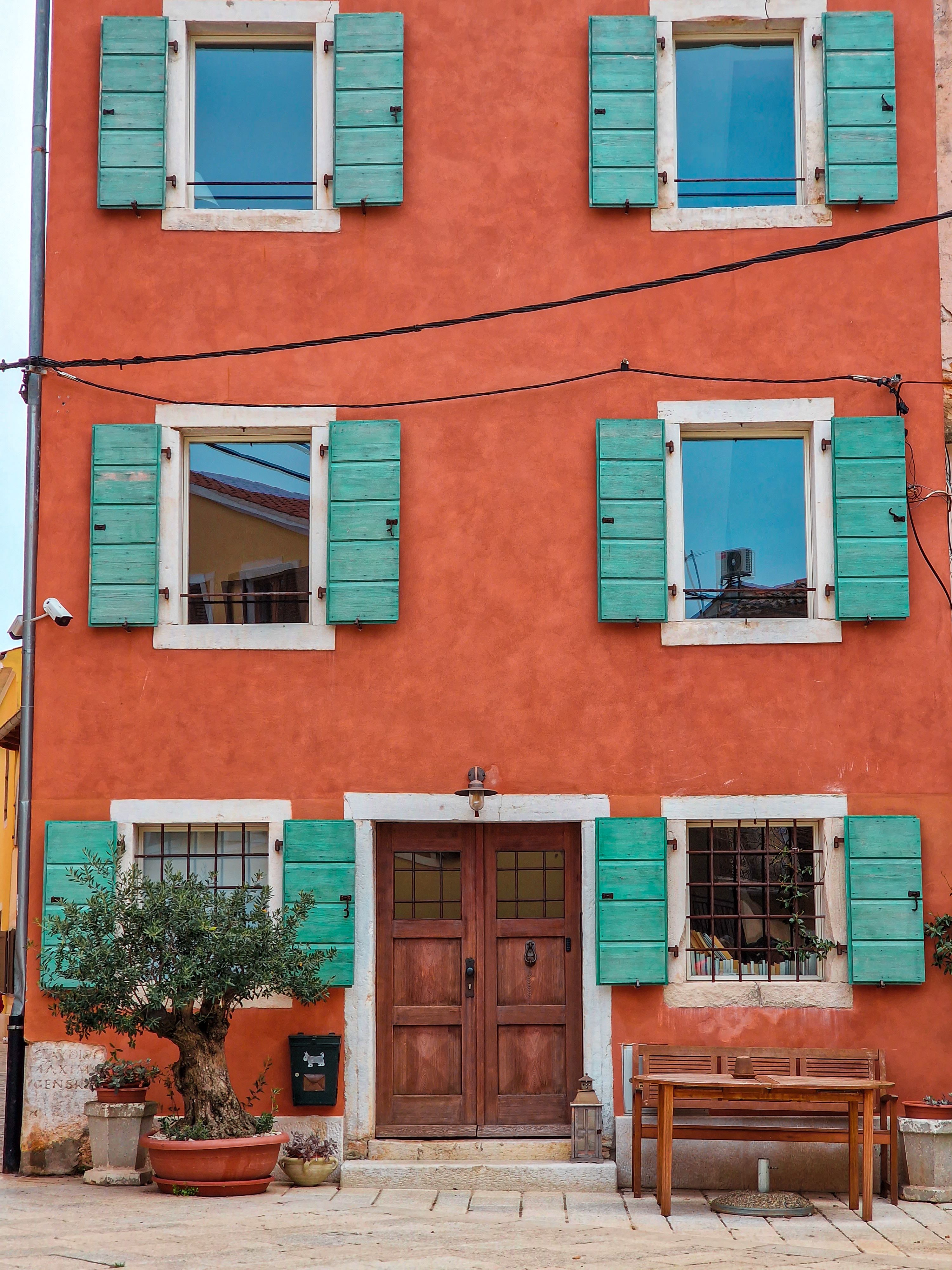 Red House with Green Shutters · Free Stock Photo