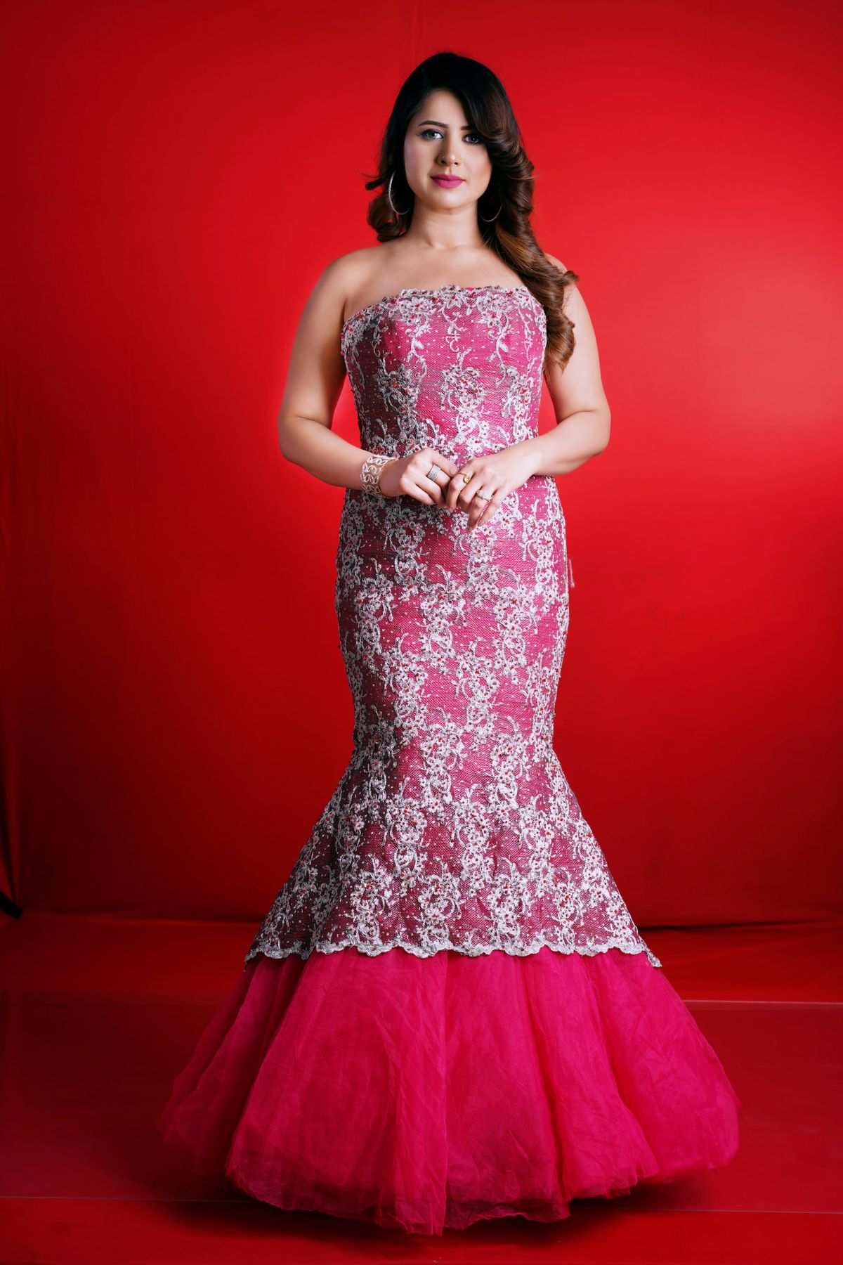 Studio Portrait of a Female Model Wearing a Pink Dress · Free Stock Photo