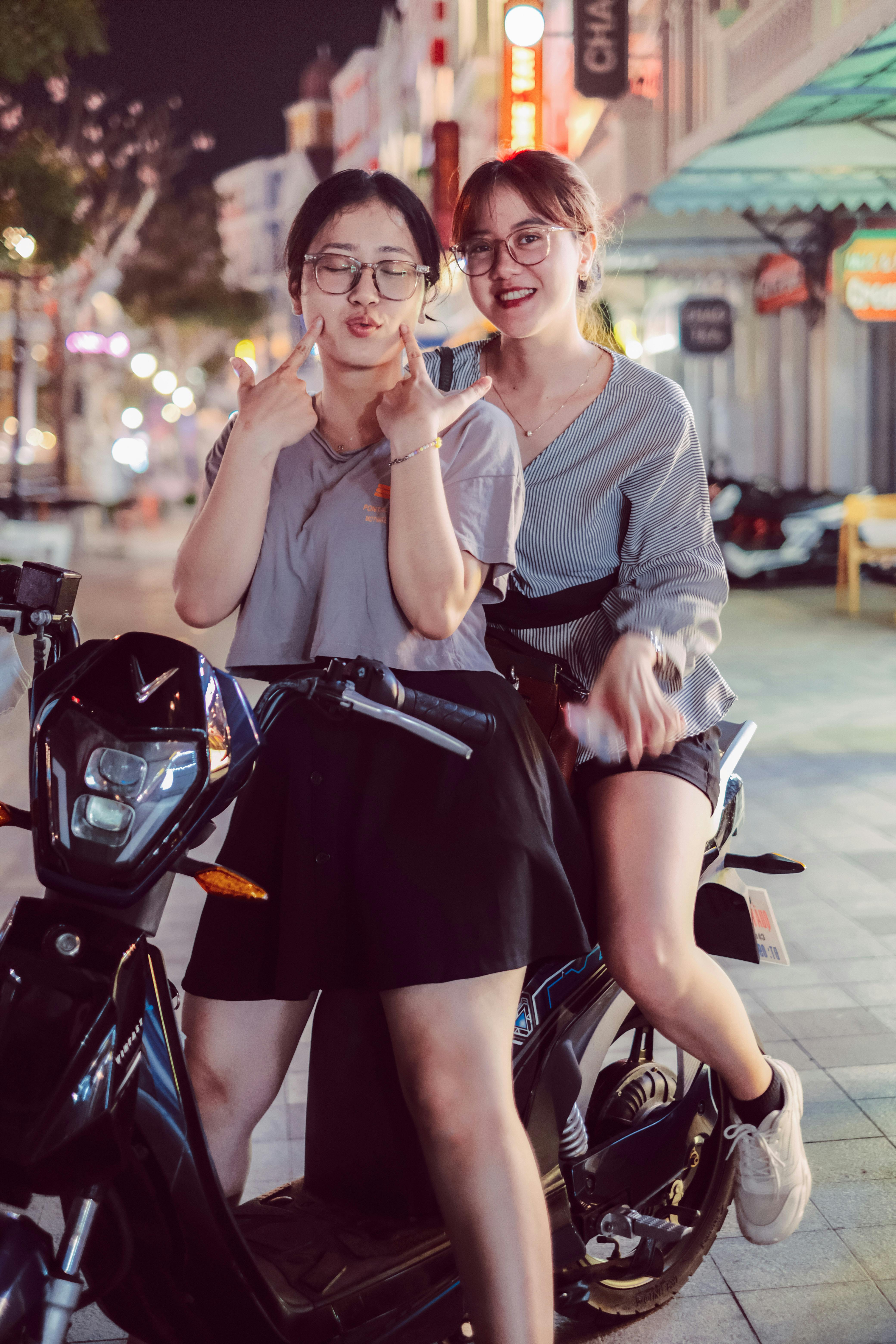 Couple Sitting On Scooter Together Posing Stock Photo 723619819 |  Shutterstock