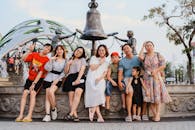 Group of People Posing next to a Sculpture in the Grand World Phu Quoc in Vietman