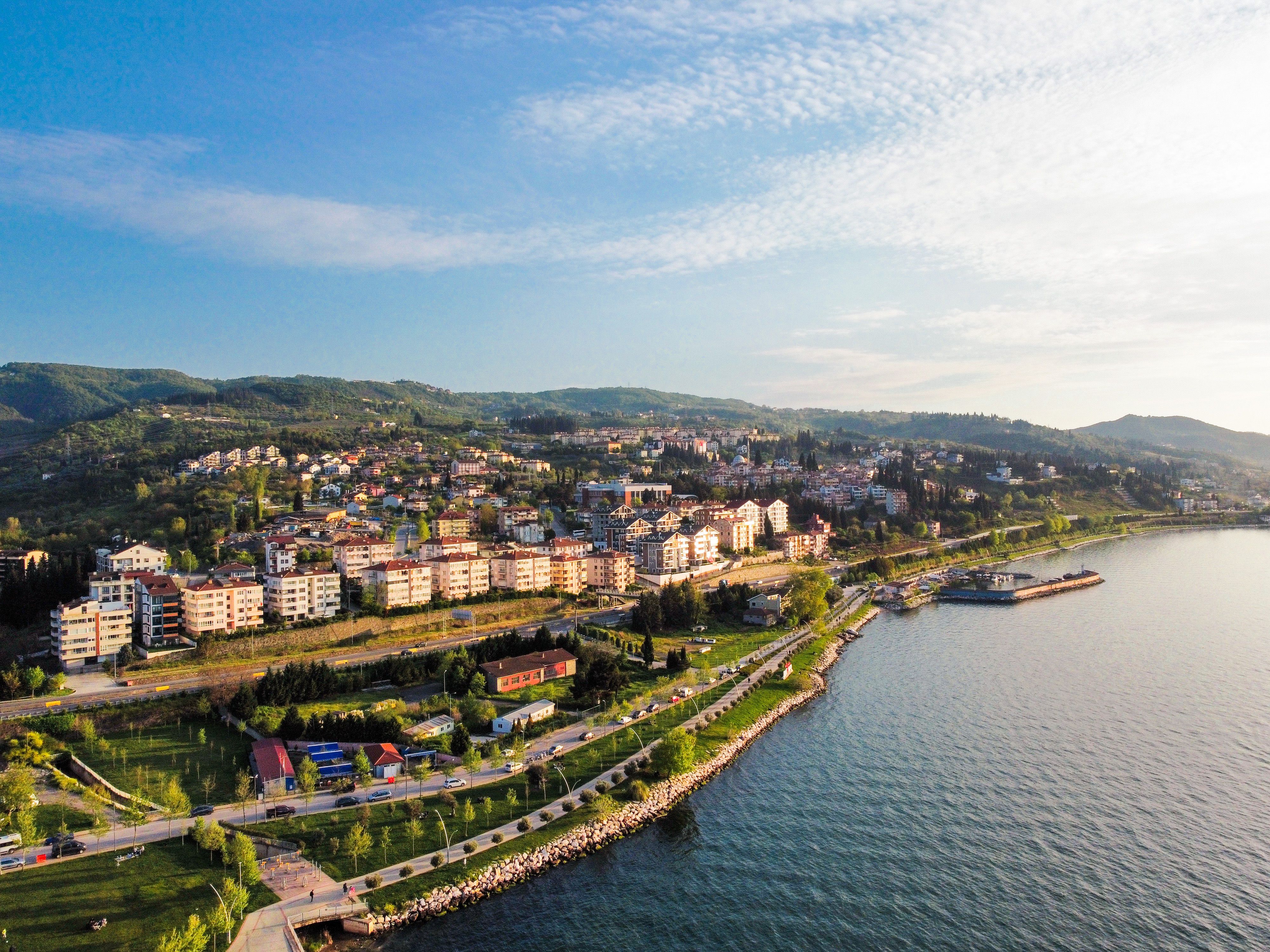 Aerial View of a Coastal City on a Hill · Free Stock Photo