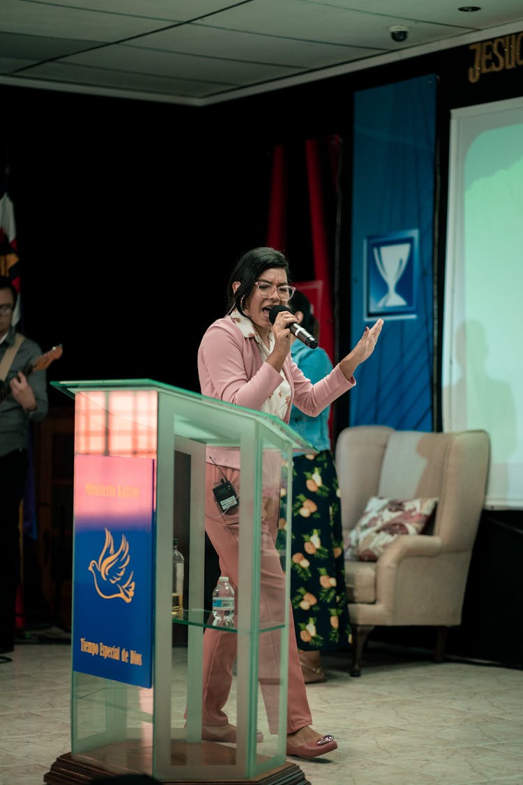 Woman Speaking During Religious Meeting