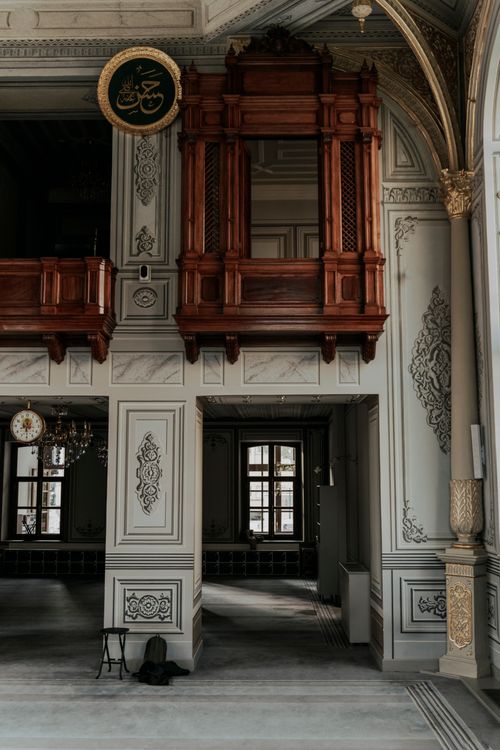 Free Intricate architectural details of a historical mosque interior with wooden elements. Stock Photo