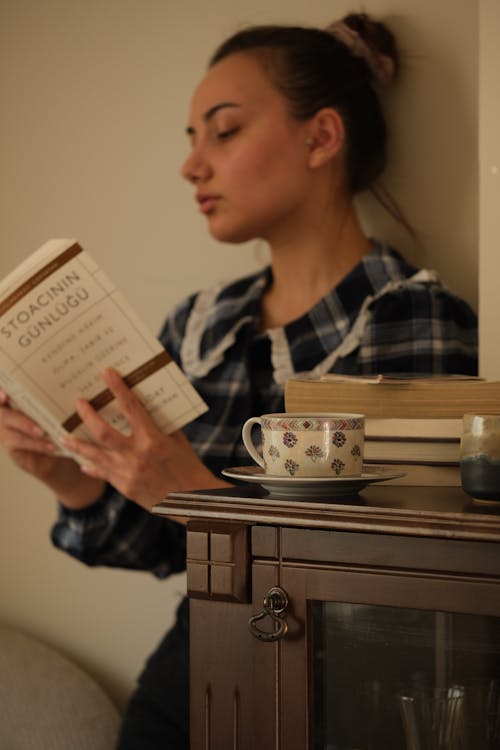 Young Woman Reading a Book 