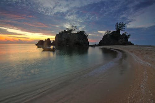 Seashore during Sunrise Photo