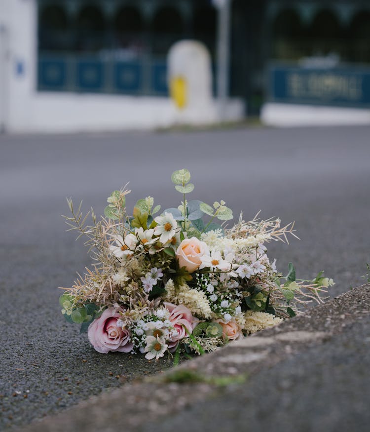 Bouquet On Asphalt