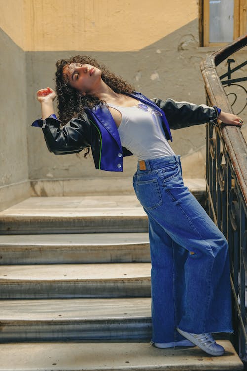 Woman in Jacket and Jeans