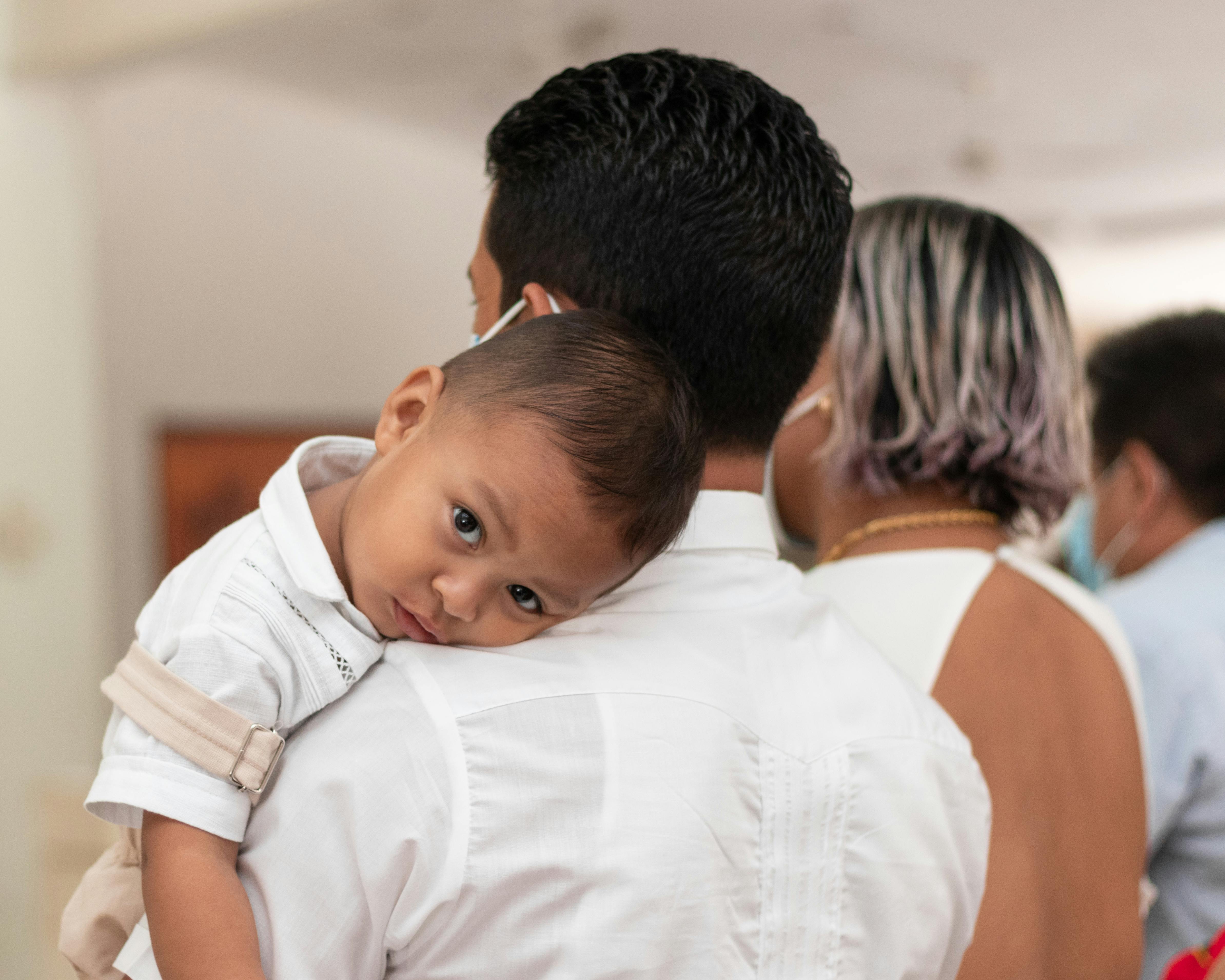 Little Child in the Arms of the Father · Free Stock Photo