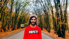 Man Wearing Red Crew-neck Sweater