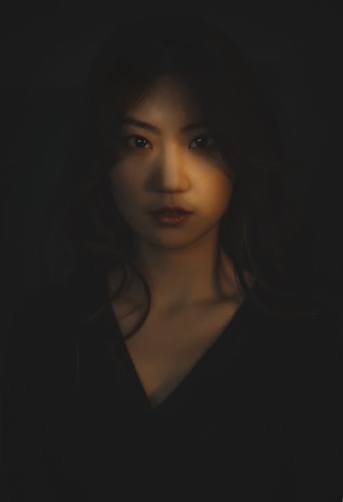 Woman Portrait in Darkness