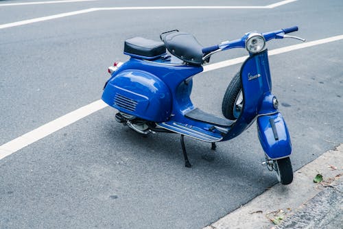 Parked Blue Motor Scooter