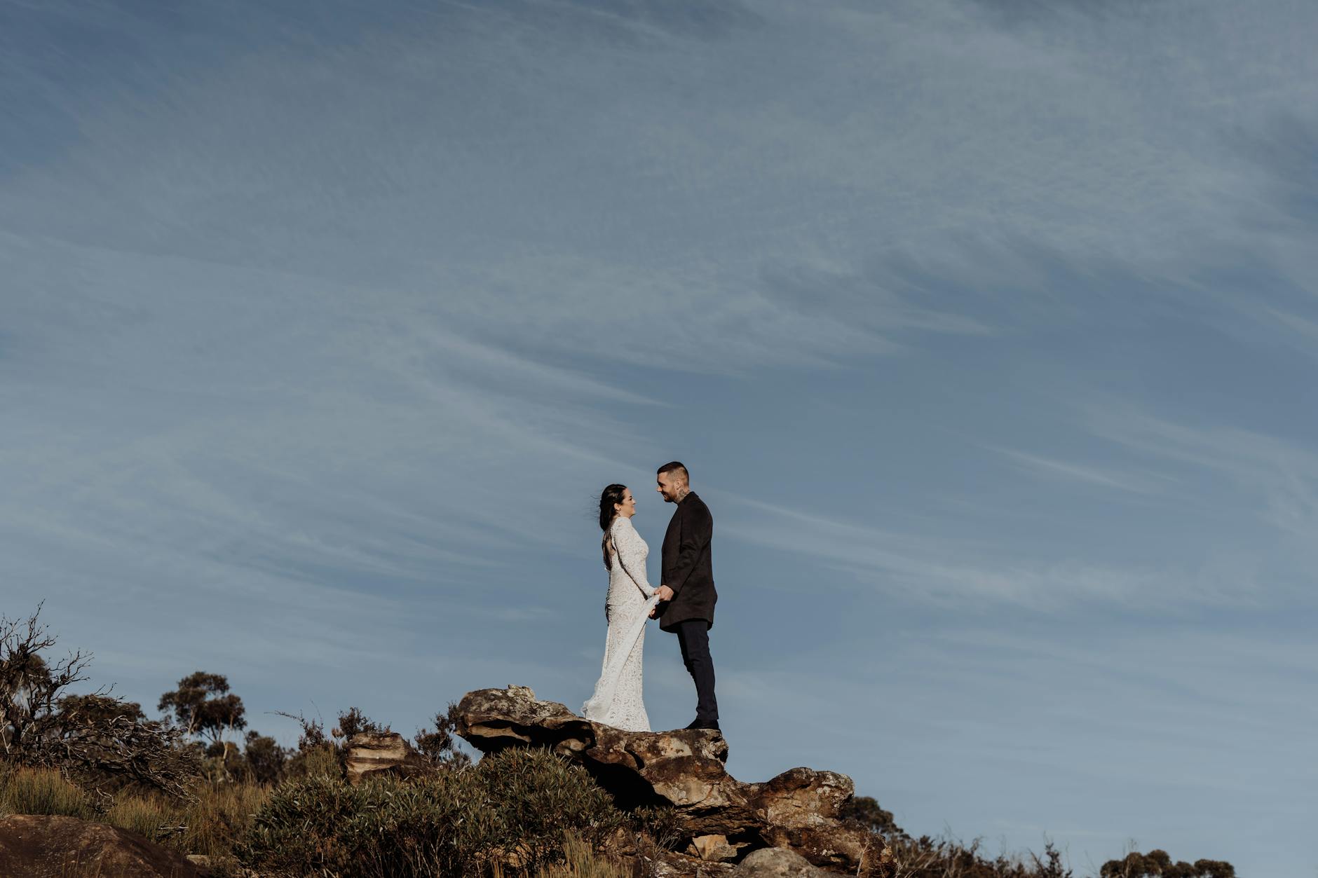 Couple during their elopement ceremony at a Rib Mountain State Park landmark
