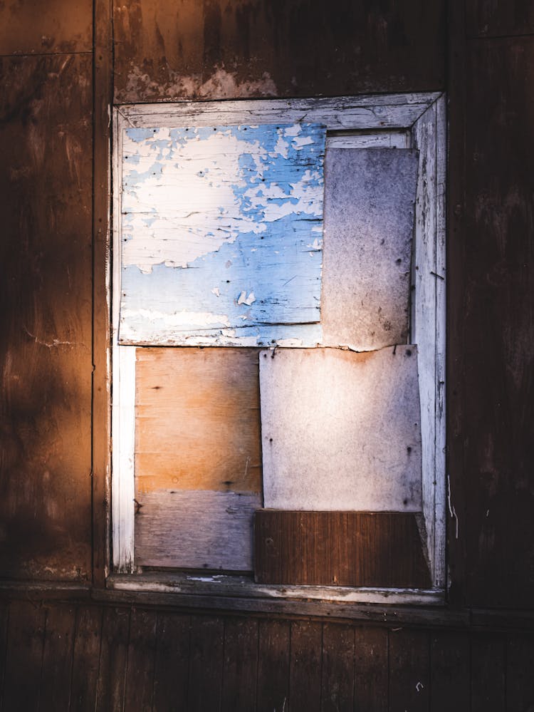 Covered Window Of Abandoned House