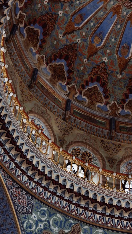Free Intricately detailed Byzantine-style cathedral ceiling with frescoes and ornate decorations. Stock Photo