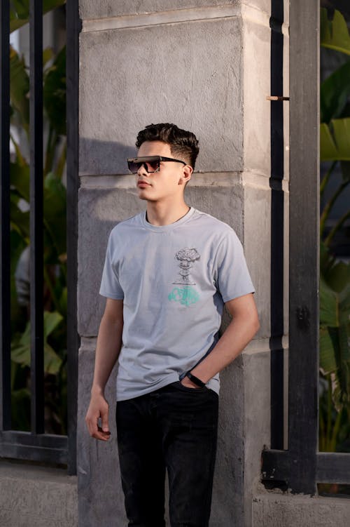 Man Posing in Sunglasses and T-shirt