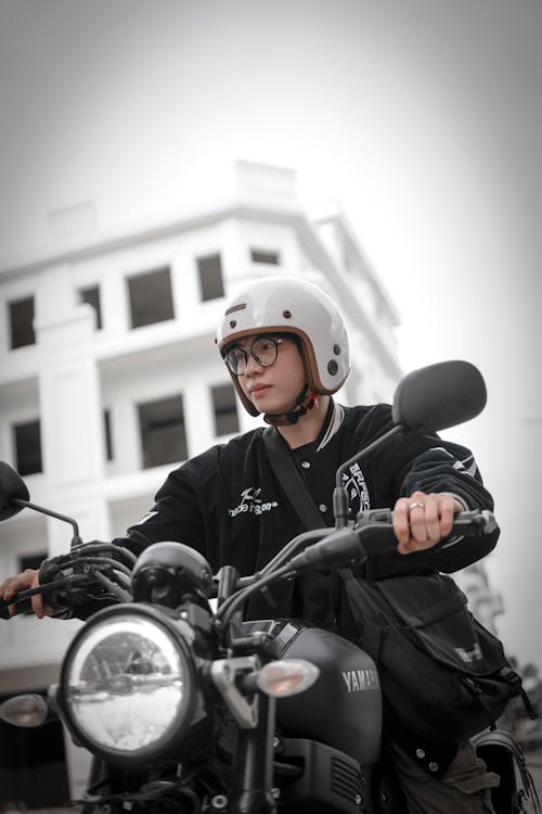 Young Man on a Motorcycle in City 