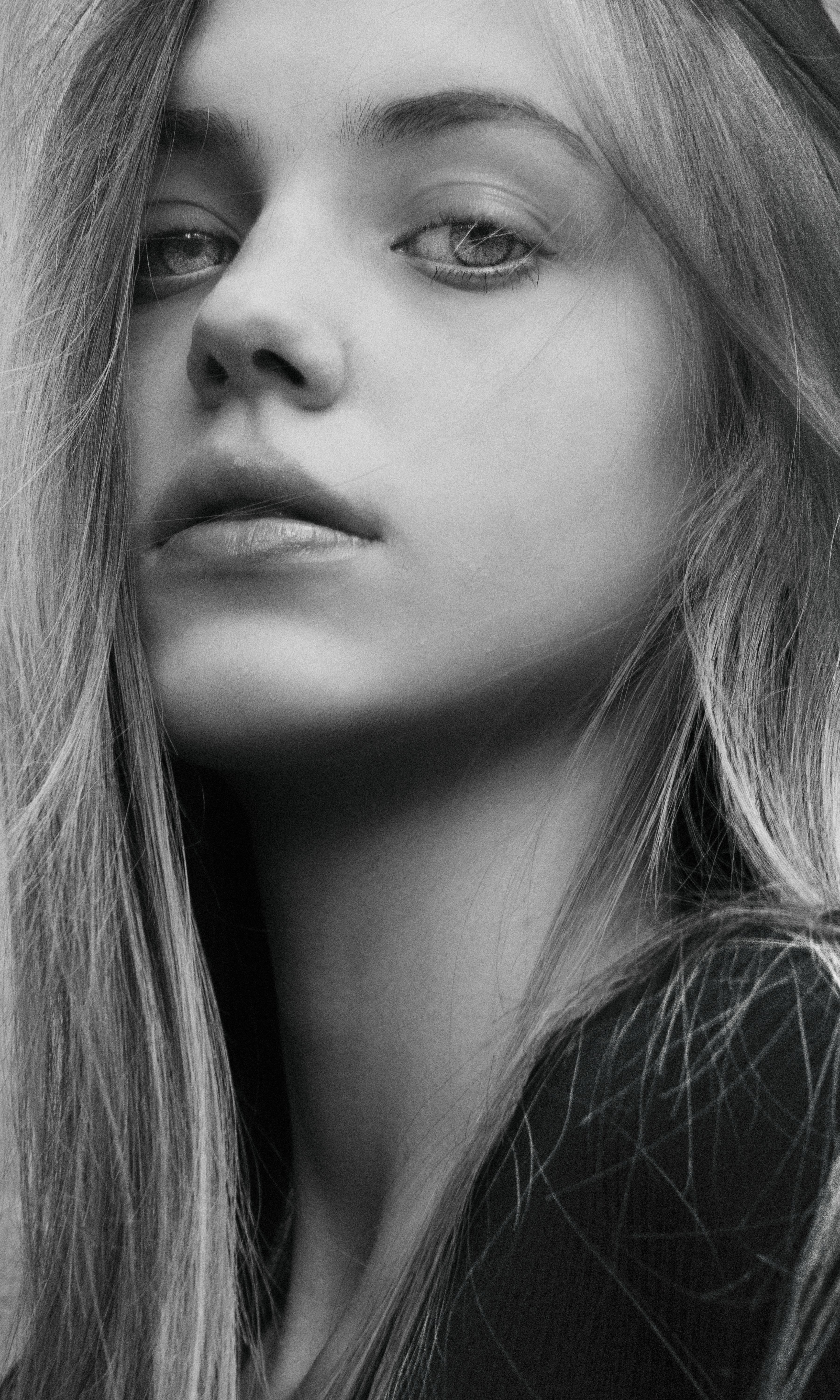 Elegant monochrome portrait highlighting youth and beauty.